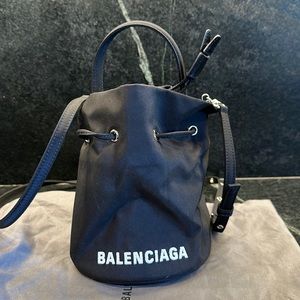 BALENCIAGA
Wheel XS Logo Drawstring Bag